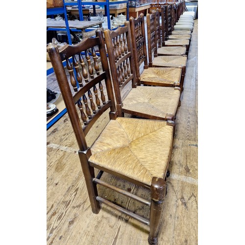 415 - Set of eight 20th century oak rush seated dining chairs with turned stretchers