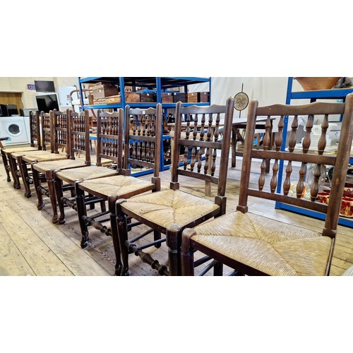 415 - Set of eight 20th century oak rush seated dining chairs with turned stretchers