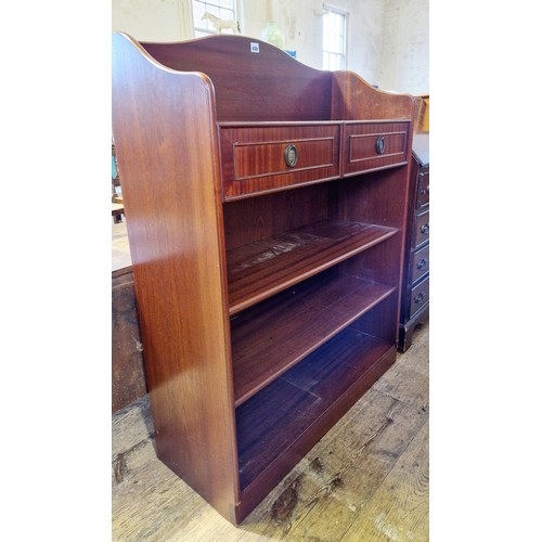 430 - Reproduction mahogany three-tier open book case with open shelves and upper drawers