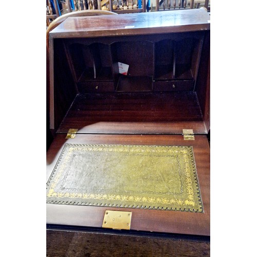 431 - Reproduction mahogany narrow bureau on a base of four drawers