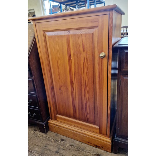 432 - Modern pine cupboard with shelved interior