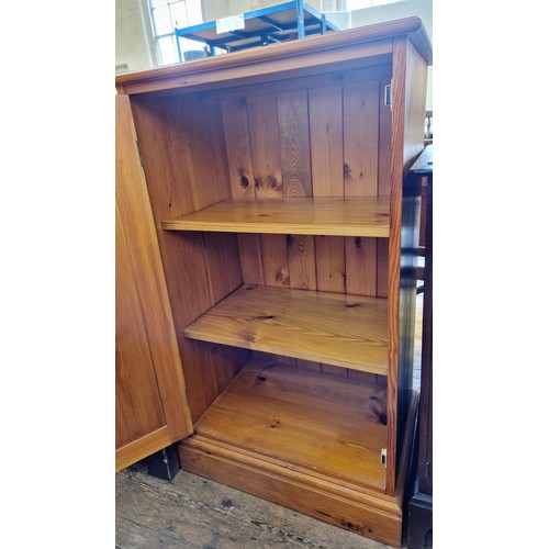 432 - Modern pine cupboard with shelved interior