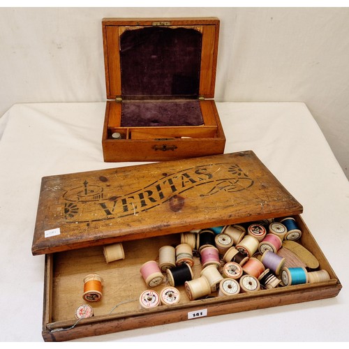 141 - Mahogany writing box and wooden case of cotton reels stamped Veritas