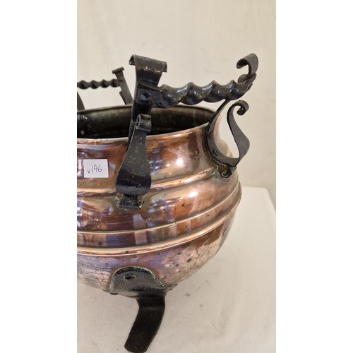 150 - Hammered copper and iron bowl and brass warming pan