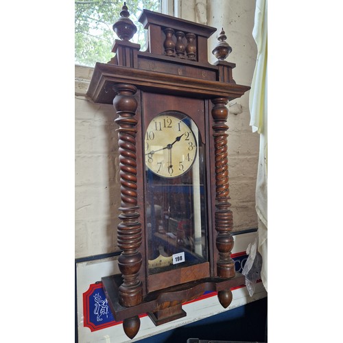 198 - Wooden cased wall clock with quartz movement