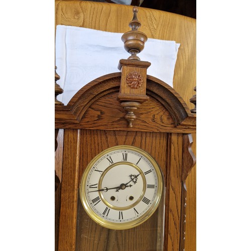 200 - Oak cased Vienna wall clock