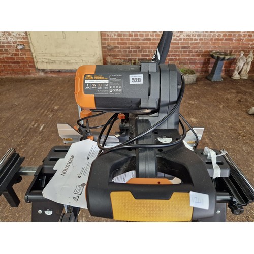 520 - Evolution R255 double bevel sliding mitre saw on stand with 2 used blades