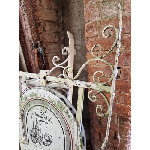 544 - Two wrought metal hanging sign brackets