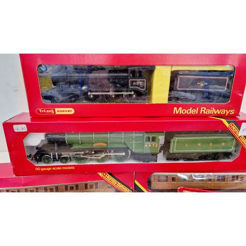 218 - Six items of boxed Tri-ang and Hornby OO gauge model railway incl. Flying Scotsman and tender R855, ... 