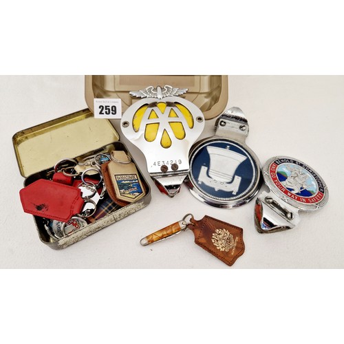 259 - Motoring ephemera incl. vintage AA badge and others, key rings etc