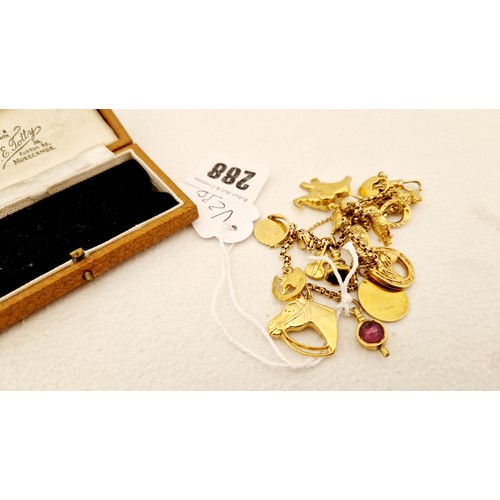 288 - A 9ct gold charm bracelet, with c. 16 charms approx. 31.5 g