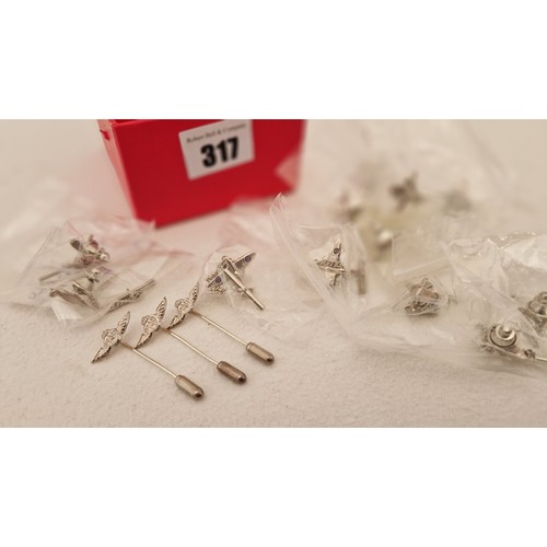 317 - 12 Spitfire tie pins and 3 RAF pins