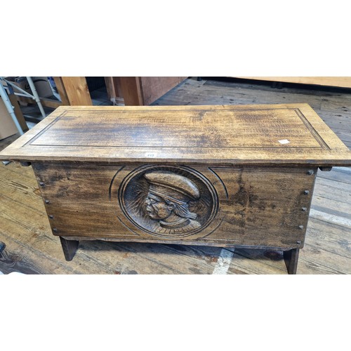 413 - Mid century hardwood coffer with relief portrait panel