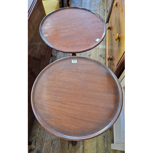 434 - Pair of reproduction mahogany tilt top circular occasional tables