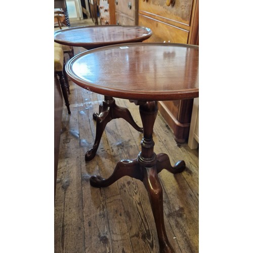 434 - Pair of reproduction mahogany tilt top circular occasional tables