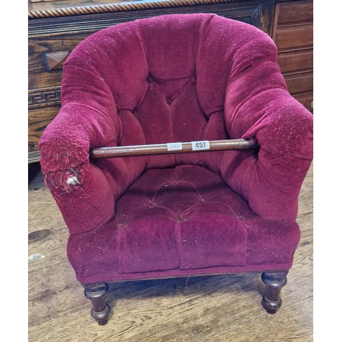 457 - Childs Victorian upholstered armchair on turned legs