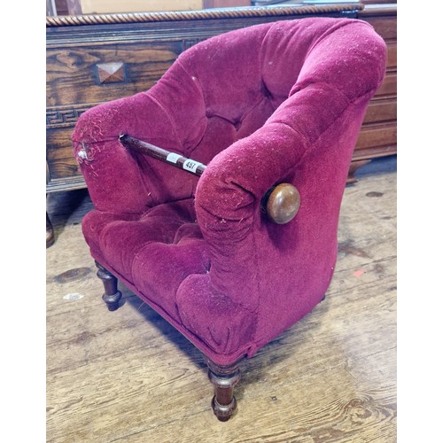 457 - Childs Victorian upholstered armchair on turned legs