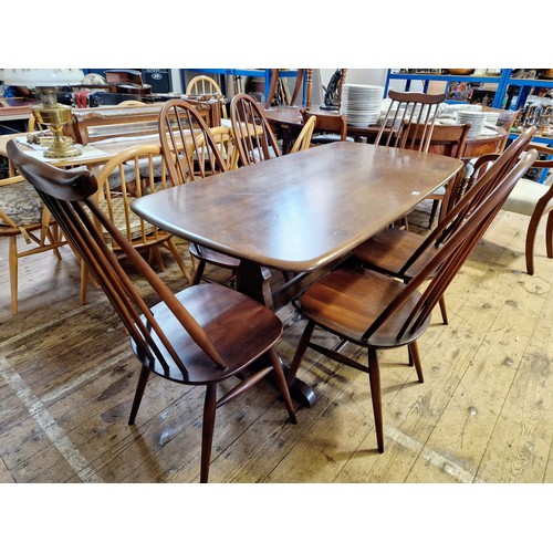 406 - Mid century dark Ercol style dining suite, comprising rectangular table and 6 Quaker chairs