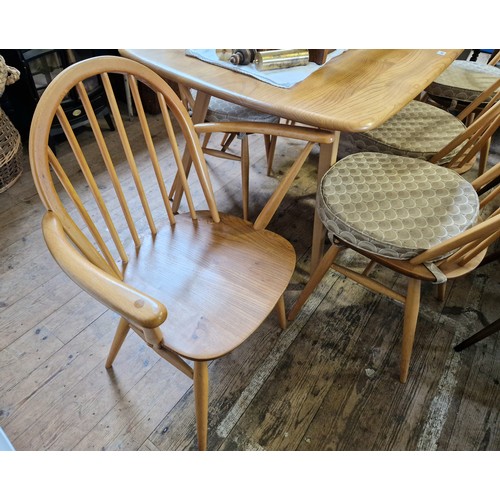 407 - Ercol Windsor dining suite comprising rectangular table, 6 spindle back chairs (5+1) and a single Qu... 