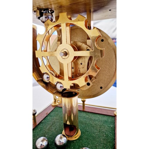 193 - Thwaites & Reed brass rolling ball clock