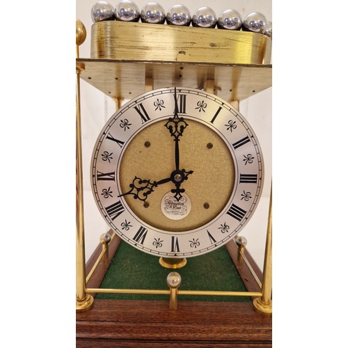 193 - Thwaites & Reed brass rolling ball clock