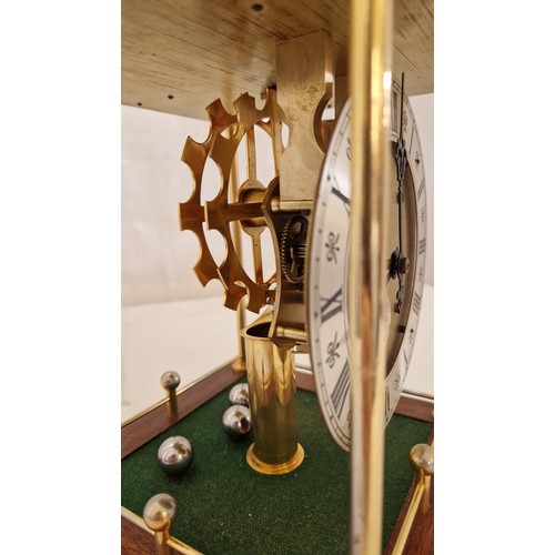 193 - Thwaites & Reed brass rolling ball clock