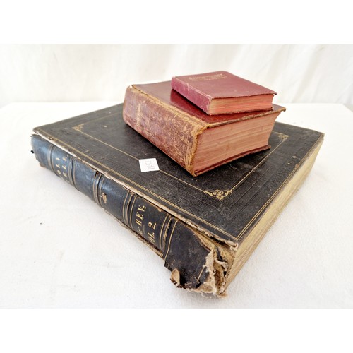 3 - Three religious volumes, two leather bound bibles and a communicants manual (broken spine to one)