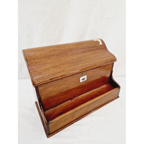 102 - Early 20th century mahogany stationery box with serpentine lid, fitted interior and pen tray