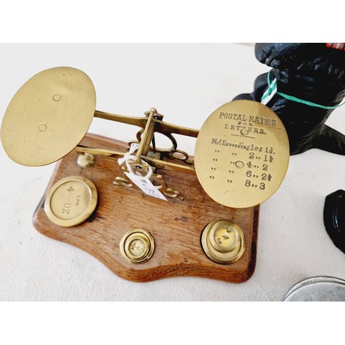 114 - Set of brass postal scales on wooden plinth, 2 vintage fly wheels and Terrier & Owl doorstops