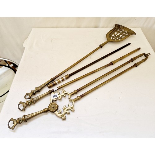 146 - Set of ornate brass fire irons