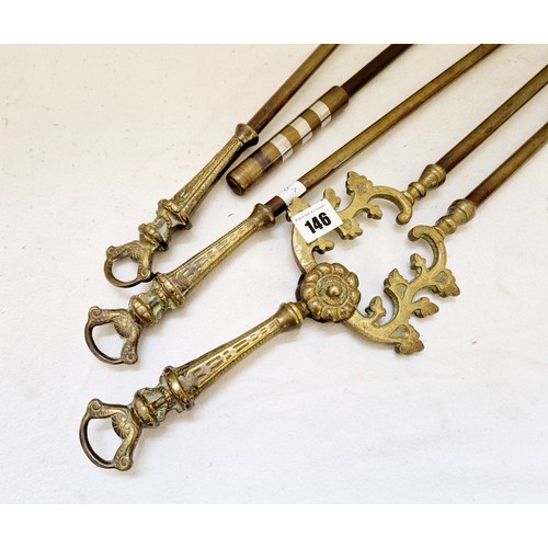 146 - Set of ornate brass fire irons