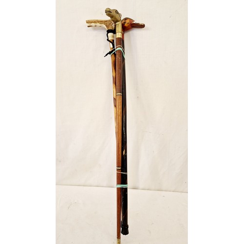 149 - Three walking sticks with antler, horse form and brass duck handles