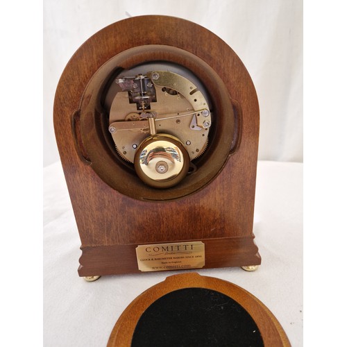 179 - Comitti London mahogany cased mantel clock on brass feet