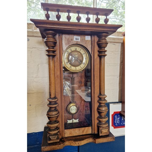 184 - Edwardian mahogany cased wall clock with spell band