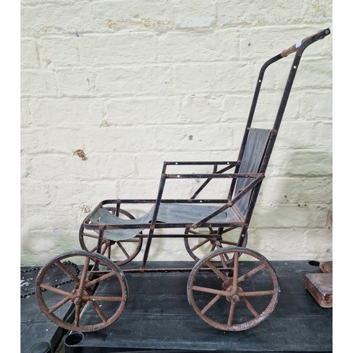 193 - Victorian dolls pushchair on iron spoked wheels