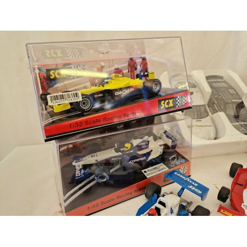 209 - Nine various boxed and loose Scalextric cars including Formula 1, Raleigh etc