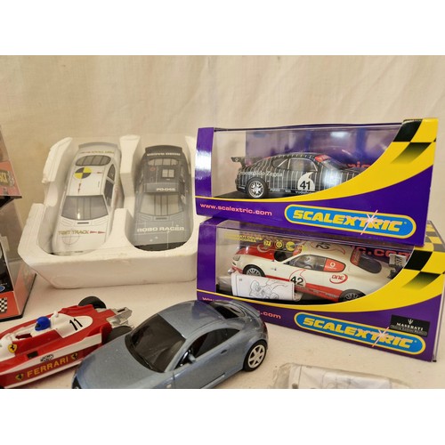 209 - Nine various boxed and loose Scalextric cars including Formula 1, Raleigh etc