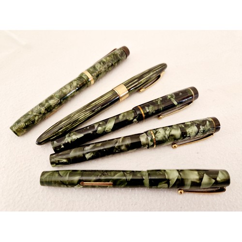 222 - A collection of five green mottle cased fountain pens, two Mentmore Auto-Flow, one lever fill; Valen... 