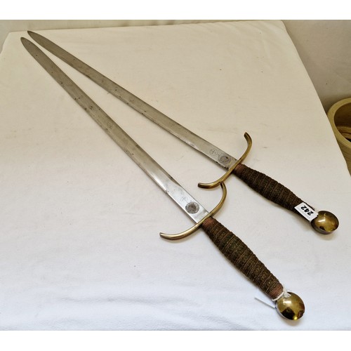 242 - Pair of ornamental swords