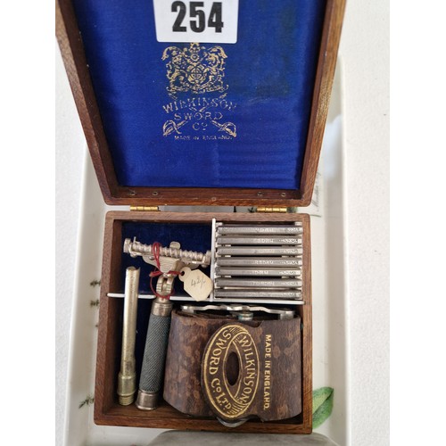 254 - Collectors lot incl. boxed Wilkinson Sword travelling shaving kit, cigarette lighters hat pins etc