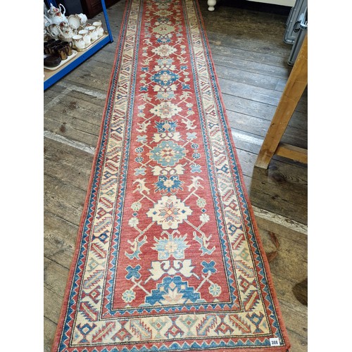 308 - Pakistani woollen patterned runner approx. 346cm x 82cm