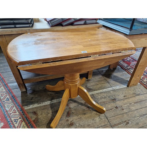 325 - Modern hardwood drop-leaf circular kitchen  table on pedestal base