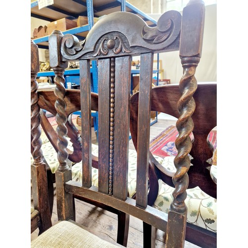 337 - A set of 6 early 20th century oak dining chairs with barley twist supports and upholstered seats