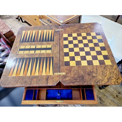 353 - Victorian walnut fold over games table with inlaid inner games surface, boxwood stringing, fitted se... 