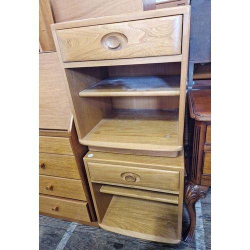 376 - Pair of Ercol beech Windsor bedside cabinets with single drawers over a shelved base