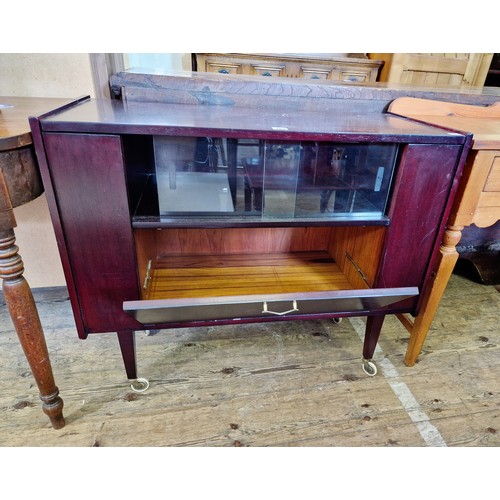 383 - Vintage drinks cabinet with fall front, glazed shelf and open sides