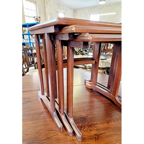 386 - Nest of three mahogany occasional tables