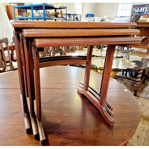 386 - Nest of three mahogany occasional tables