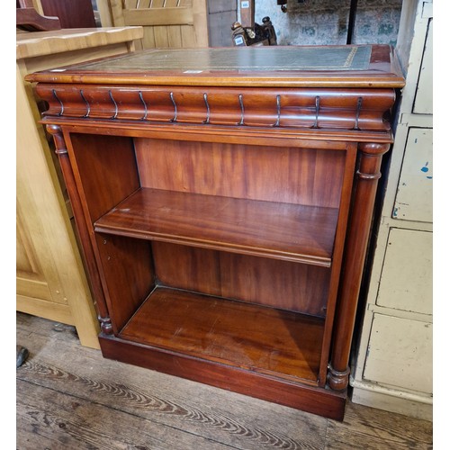 389 - Modern mahogany two-tier open bookcase with relief book spine side panels, leatherette insert top an... 