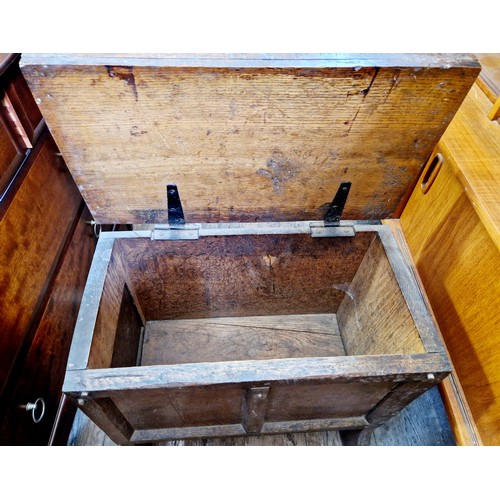 396 - Rustic oak raised chest with panelled front and lid and opening side door